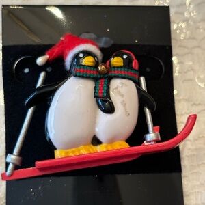 Penguin Skiing Brooch with Santa Hat